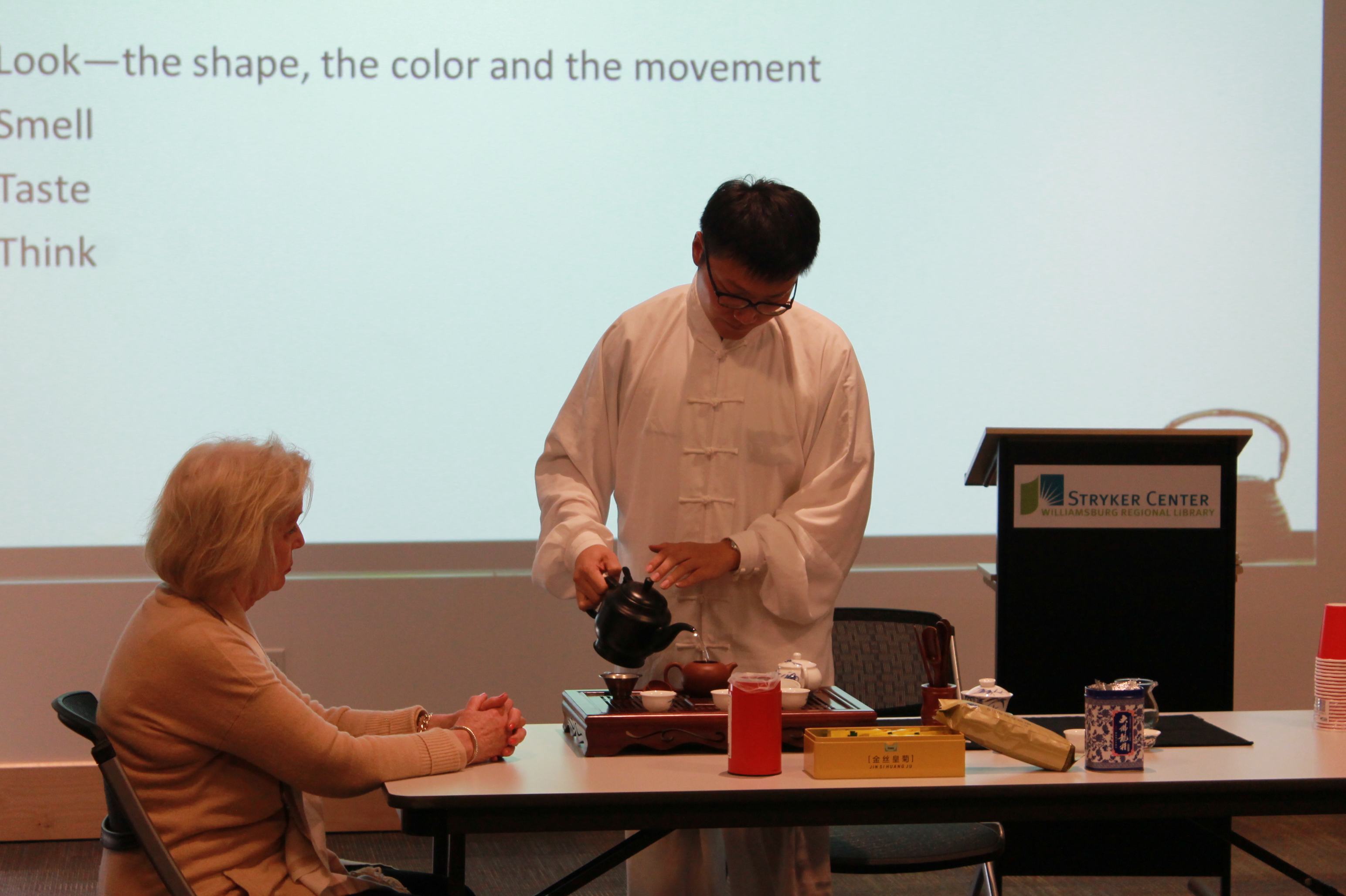 Demonstrating Tea Pouring Technique